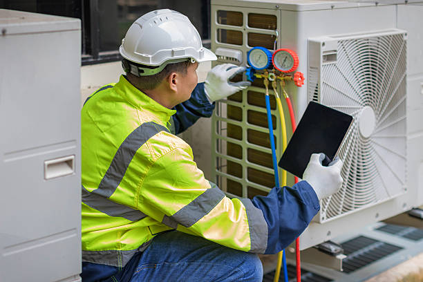Professional Heat Pump Repair technician working in Brookside, AL